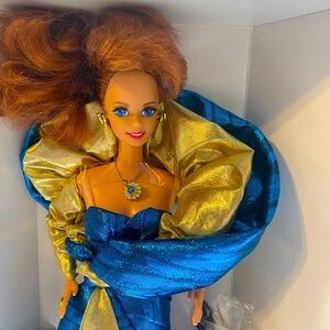 Benefit Ball Barbie collectable new never opened or out of box.